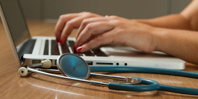 female doctor researching small business funding options for medical practices in canada