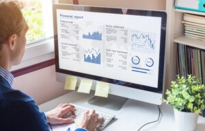 Businessman working on Financial Report: analysis of cash flow and how the business line of credit helped it